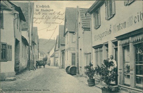 Alte Ansichtskarte Kiedrich im Rheingau, Partie im Ort mit Metzgerei