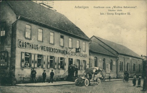 Alte Ansichtskarte Arheiligen, Gasthaus zum "Weißen Schwanen". Telefon 1848. Inh.: Georg Erzgräber III