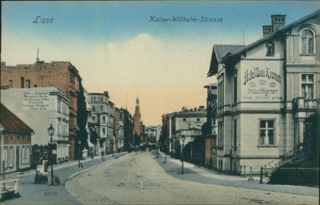 Alte Ansichtskarte Lissa, Kaiser-Wilhelm-Strasse mit Hotel Drei Kronen Inh. Louis Hilgermann