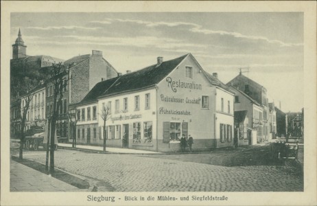 Alte Ansichtskarte Siegburg, Blick in die Mühlen- und Siegfeldstraße
