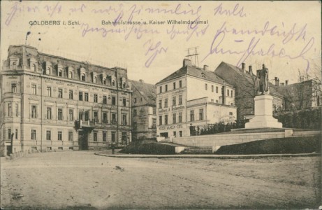 Alte Ansichtskarte Goldberg / Złotoryja, Bahnhofstrasse u. Kaiser Wilhelmdenkmal