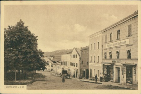 Alte Ansichtskarte Grafenau, Straßenpartie mit Kaufhaus Johann Wiedenmann