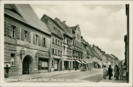 Alte Ansichtskarte Eilenburg, Torgauer Straße mit Hotel "Roter Hirsch" gegr. 1502