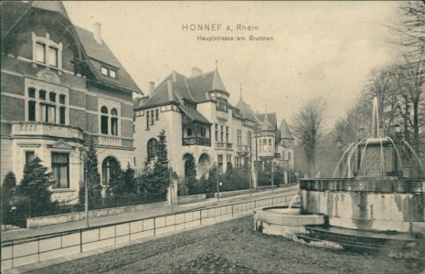 Alte Ansichtskarte Bad Honnef, Hauptstrasse am Brunnen