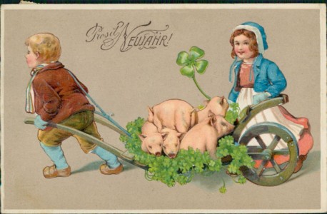 Alte Ansichtskarte Prosit Neujahr, Knabe zieht Karren mit Schweinen beladen, Mädchen mit Kleeblatt