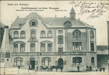 Alte Ansichtskarte Herne-Sodingen, Hotel-Restaurant von Heinr. Wiesmann, Haltestelle der elektr. Straßenbahn, Fernruf No. 308
